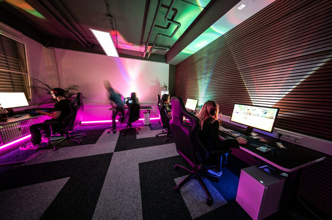 Control room with banks of monitors for live signals